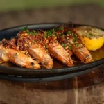 Sizzling-Bombucha-Kauai-Shrimp-with-Lup-Cheong-Chili-Crunch-Butter-Recipe