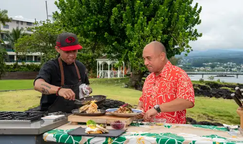 Chef Will Marquez presenting his signature Pan-Seared Ono with Kauai Shrimp Ukoy dish