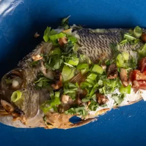 Step-by-step ingredients and preparation for Isaiah Tavares baked Mū Big Eye Emperor seafood dish