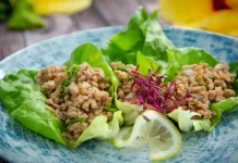 Turkey Lettuce Wrap by Anuhea Jenkins Turkey lettuce wraps made with ground turkey, hoisin sauce, Maui onion, and butter lettuce.