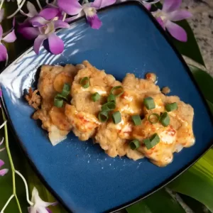 Crispy fried lomi oio bonefish patties with dipping sauce