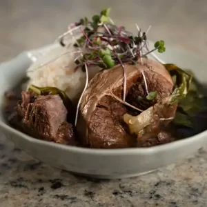 Step-by-step ingredients and finished Hawaiian soup bone recipe by Frank Abraham