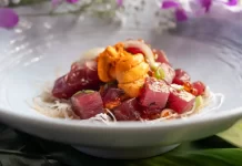 Ahi, Uni, Ikura & Truffle Poke by Kaleʻs Hale Fresh Ahi, Uni, and Ikura Truffle Poke in a bowl by Chef Kale Afong of Kale's Hale
