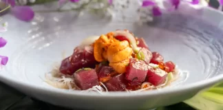 Ahi, Uni, Ikura & Truffle Poke by Kaleʻs Hale Fresh Ahi, Uni, and Ikura Truffle Poke in a bowl by Chef Kale Afong of Kale's Hale