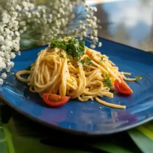 killet of rich cream cheese pasta sauce emulsified with reserved pasta water and garlic