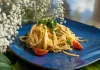 Cream Cheese Pasta by Brian Moon Bowl of creamy garlic cream cheese pasta tossed with parmesan and fresh ground black pepper by Brian Moon