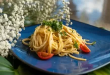 Cream Cheese Pasta by Brian Moon Bowl of creamy garlic cream cheese pasta tossed with parmesan and fresh ground black pepper by Brian Moon